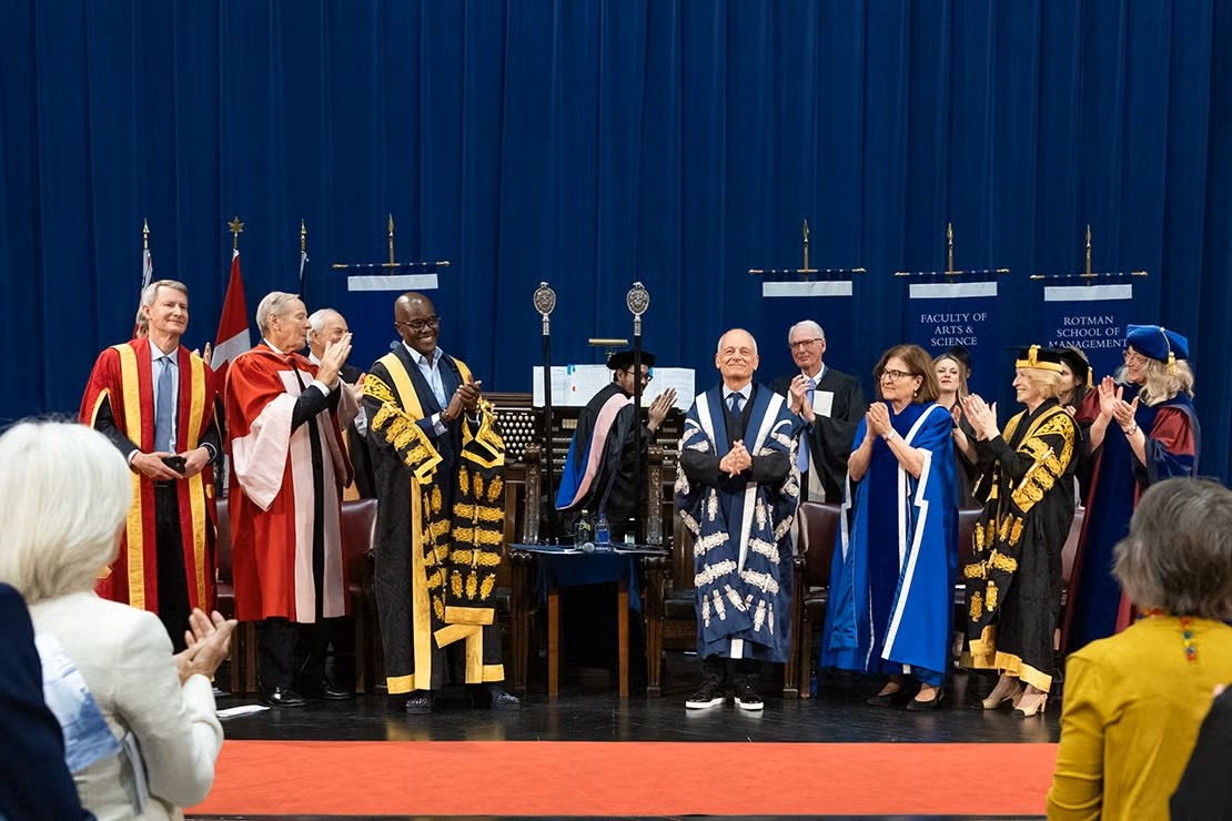U of T President Meric Gertler, wearing his blue-and-white presidential robes, receives a standing ovation during his final convocation ceremony on June 20, 2025