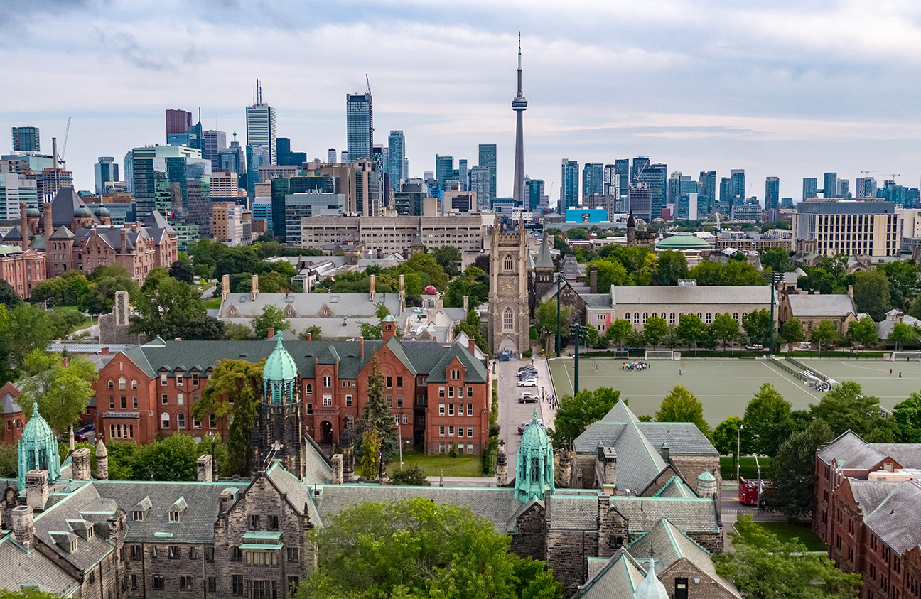 Aerial view of Trinity College with the Toronto skyline in the background.