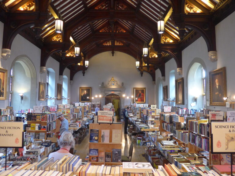 Racks of books for sale in Seeley Hall