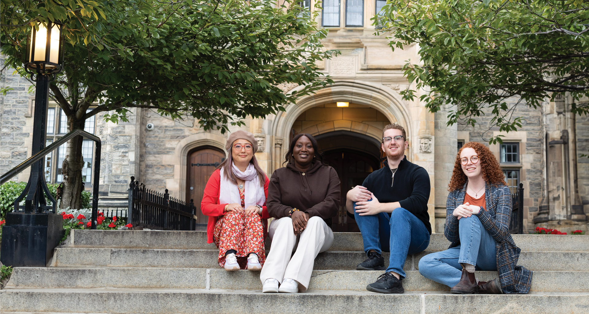 Students posing for photo near Trinity College building