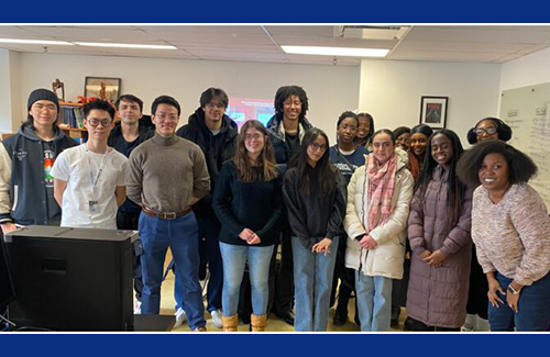 Students tour Jerry Li's lab with Cherryl-Lyn Olamuyiwa