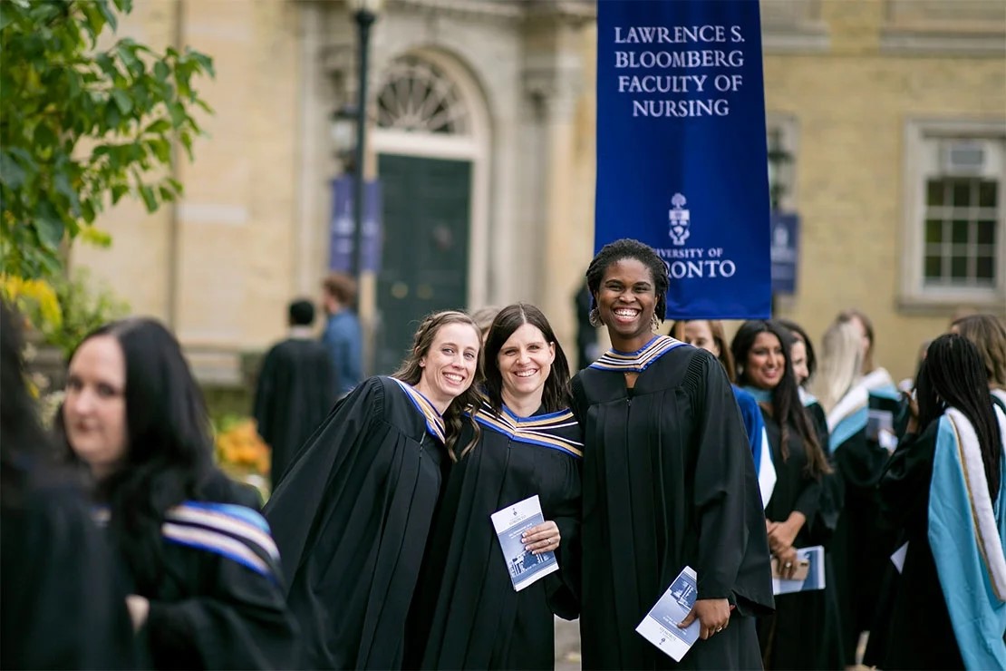 U of T graduates outside Convocation Hall, U of T