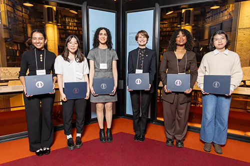 6 students holding their awards