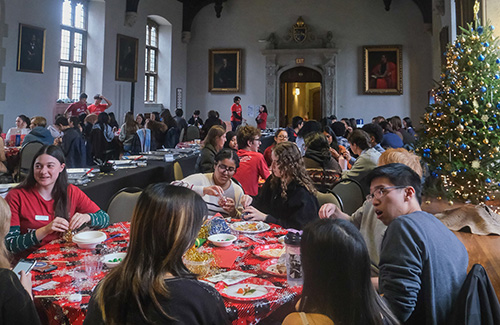 Students eat a holiday meal in Seely Hall