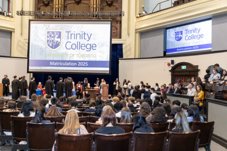 An audience of students at matriculation