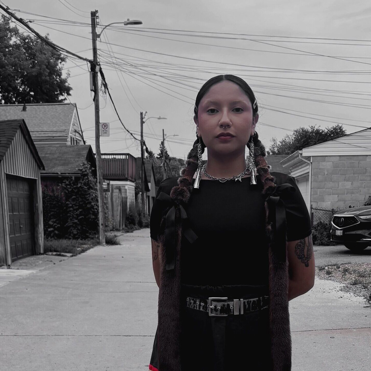 Maritza Ayala-Spence stands on a deserted street