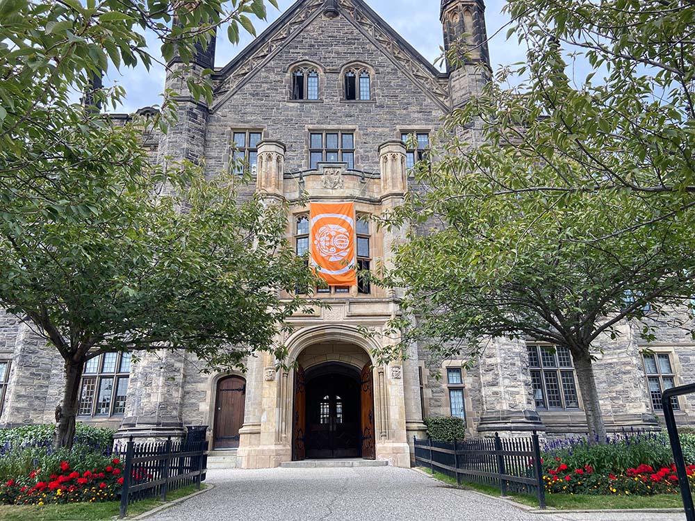 Survivor Flag hang at the front entrance to Trinity College